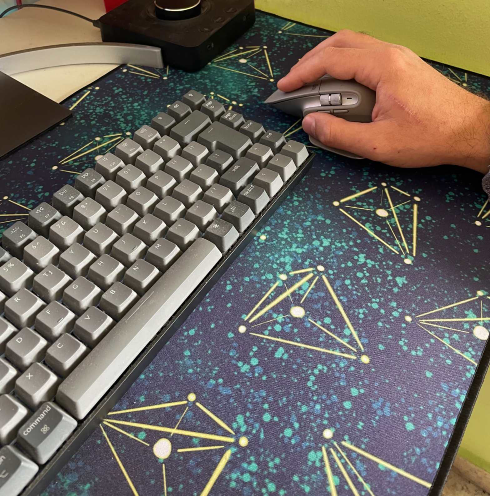 Large desk mat with a space geek galaxy pattern of pyramid constellations fading to black on one side